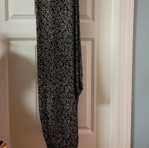 Woman's black/tan stretch size M slacks...slacks have an elastic waistband.